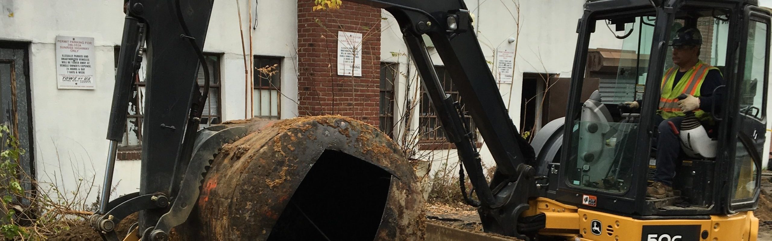 MEG employee working at demolition site